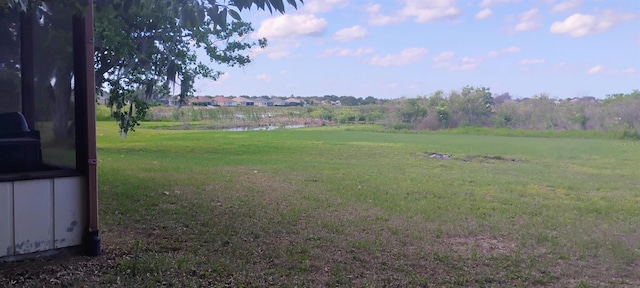 view of yard featuring a water view