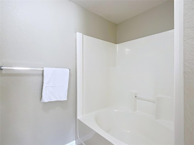 1639 Saddlehorn Dr, Lakeland, FL 33810 - bathroom with walk in shower and a bath