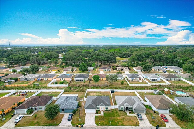 1639 Saddlehorn Dr, Lakeland, FL 33810 - aerial view with a wooded view and a residential view
