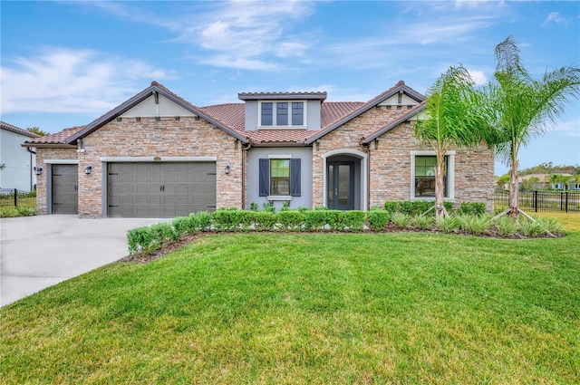 17804 Brewster Grn, Lutz, FL 33559 - craftsman inspired home featuring fence, a front lawn, a tile roof, a garage, and concrete driveway