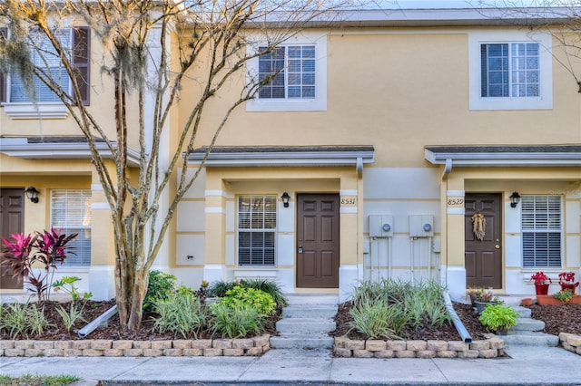 multi unit property featuring stucco siding
