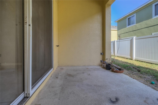 view of patio with fence