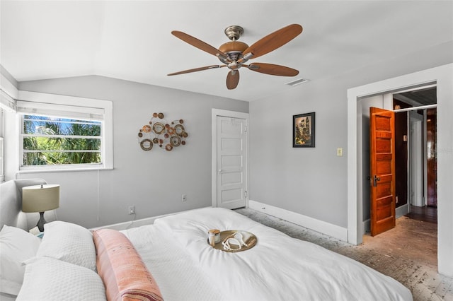 bedroom featuring visible vents, a ceiling fan, baseboards, and vaulted ceiling