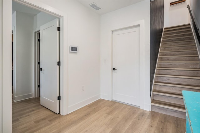 6904 S Macdill Ave Unit 1, Tampa, FL 33611 - stairs with wood finished floors and baseboards