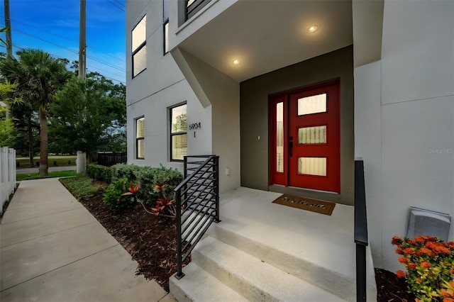 6904 S Macdill Ave Unit 1, Tampa, FL 33611 - property entrance with stucco siding and a porch