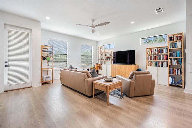 6904 S Macdill Ave Unit 1, Tampa, FL 33611 - living room featuring ceiling fan, light wood finished floors, and recessed lighting