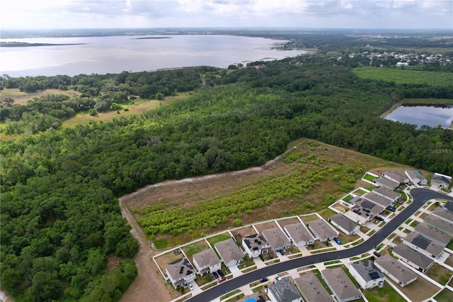 3205 Royal Tern Dr, Winter Haven, FL 33881 - drone / aerial view featuring a water view, a residential view, and a forest view
