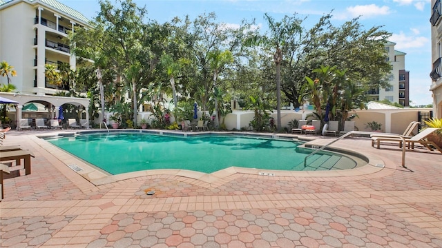 501 Knights Run Ave Unit 1335, Tampa, FL 33602 - community pool with a patio