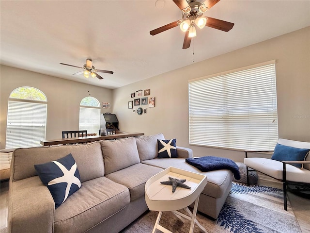 living area with ceiling fan