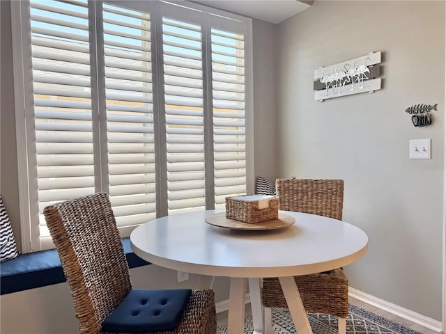 dining space with baseboards