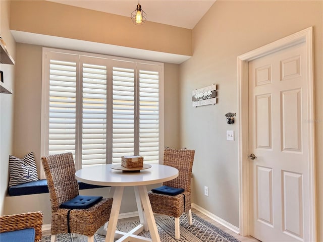 dining space with baseboards