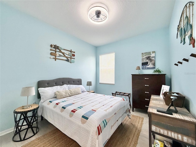 bedroom with baseboards