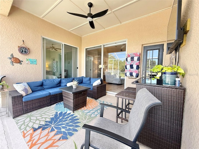 view of patio / terrace featuring a ceiling fan and an outdoor hangout area