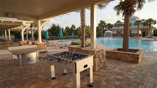 19314 Long Lake Ranch Blvd, Lutz, FL 33558 - view of patio / terrace with a community pool