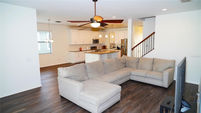 19314 Long Lake Ranch Blvd, Lutz, FL 33558 - living area featuring baseboards, dark wood finished floors, a ceiling fan, recessed lighting, and stairs