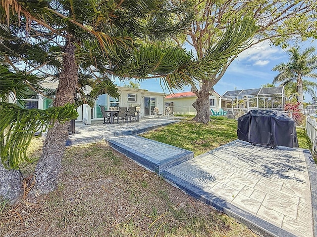 view of yard with a patio area and fence