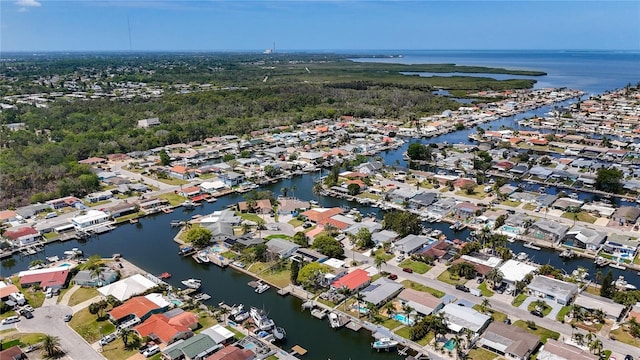 bird's eye view featuring a water view and a residential view