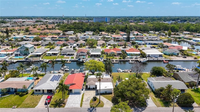 bird's eye view with a water view and a residential view