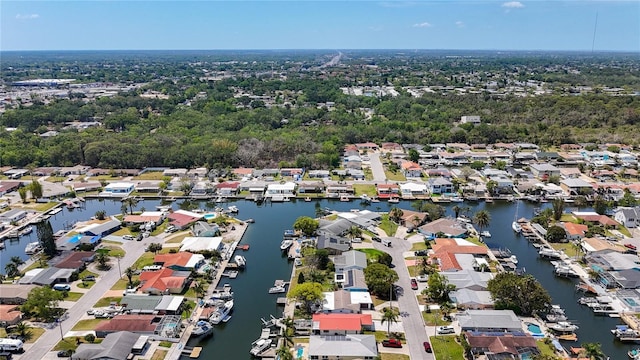 aerial view with a residential view and a water view