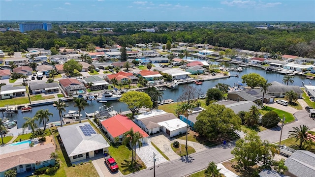 aerial view featuring a water view and a residential view