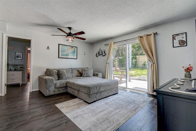 8497 137th St, Seminole, FL 33776 - living room with a ceiling fan, dark wood-style floors, and a textured ceiling