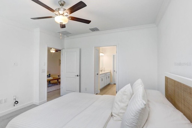 10998 Gable Dig Loop, San Antonio, FL 33576 - bedroom featuring visible vents, ornamental molding, and a ceiling fan