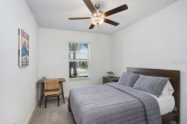 10998 Gable Dig Loop, San Antonio, FL 33576 - bedroom with carpet flooring, a ceiling fan, and baseboards