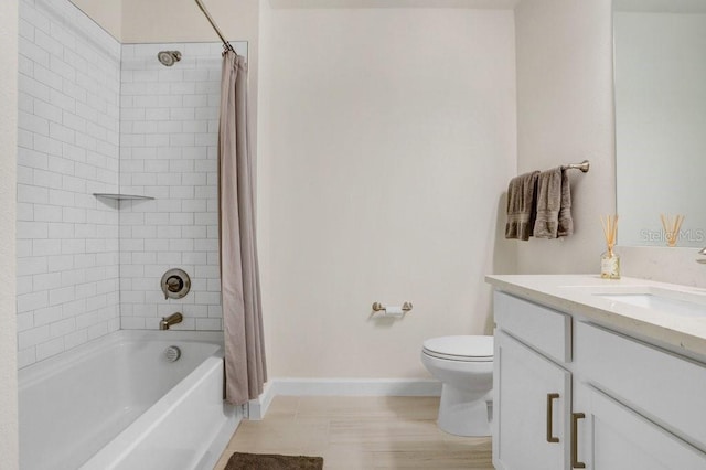 10998 Gable Dig Loop, San Antonio, FL 33576 - full bath with vanity, toilet, baseboards, tile patterned floors, and shower / tub combo