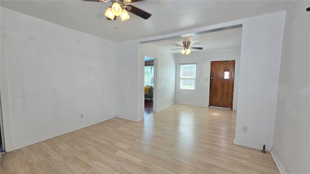 342 N 40th St N, Saint Petersburg, FL 33713 - foyer featuring baseboards, light wood-style flooring, and ceiling fan
