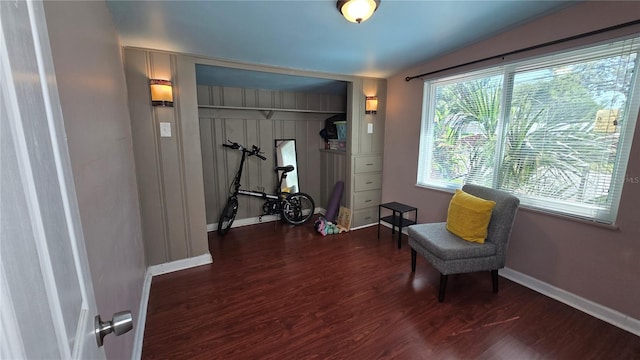 342 N 40th St N, Saint Petersburg, FL 33713 - living area with baseboards, wood finished floors, and lofted ceiling