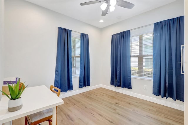 interior space with recessed lighting, baseboards, ceiling fan, and light wood finished floors