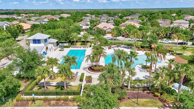 birds eye view of property with a residential view