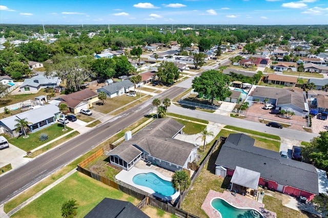 birds eye view of property with a residential view