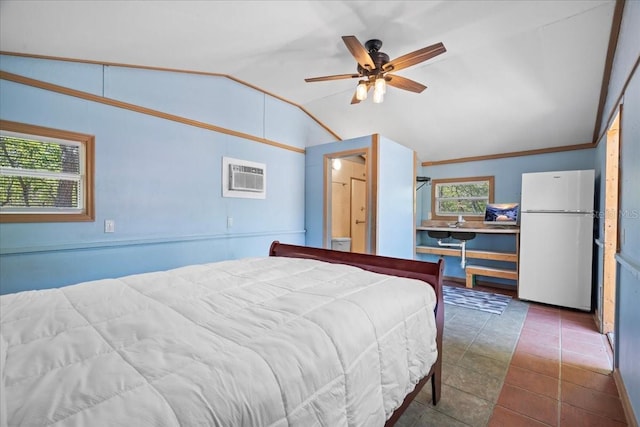 bedroom featuring a wall mounted air conditioner, freestanding refrigerator, a ceiling fan, and vaulted ceiling
