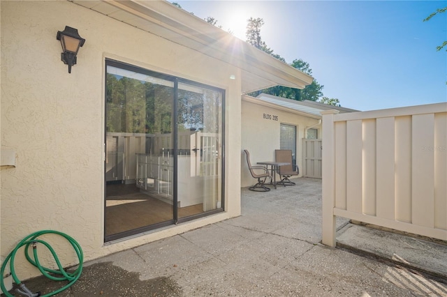 view of patio / terrace with fence