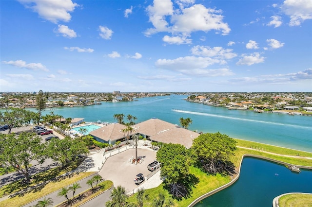 birds eye view of property featuring a water view
