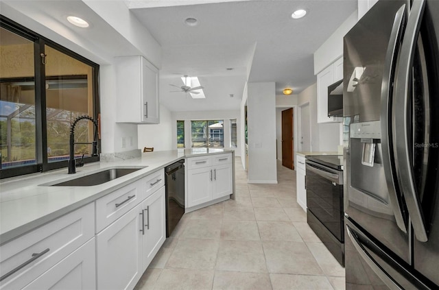 280 Fortaleza St, Punta Gorda, FL 33983 - kitchen featuring black appliances, a sink, a ceiling fan, white cabinetry, and recessed lighting