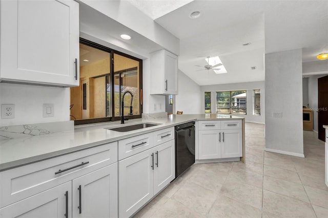 280 Fortaleza St, Punta Gorda, FL 33983 - kitchen with a sink, dishwasher, white cabinets, a peninsula, and light tile patterned flooring