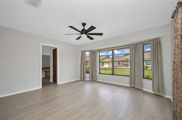 280 Fortaleza St, Punta Gorda, FL 33983 - spare room with wood finished floors, a ceiling fan, and baseboards