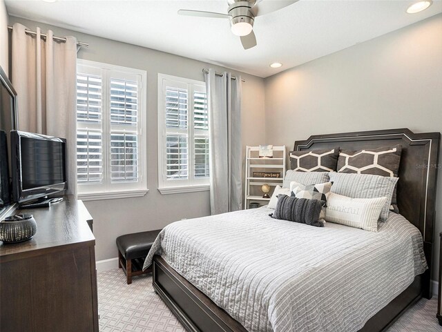 bedroom featuring baseboards, recessed lighting, carpet floors, and ceiling fan