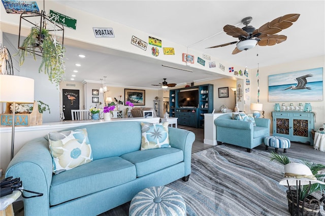 living area featuring a ceiling fan, visible vents, wood finished floors, and recessed lighting