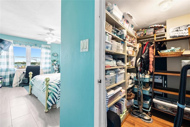 storage area with a ceiling fan