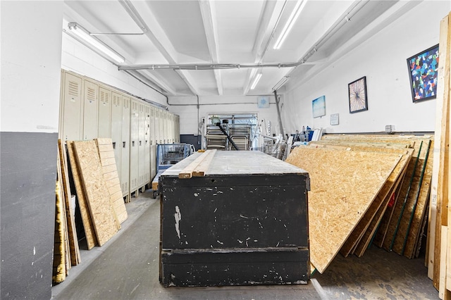 interior space featuring finished concrete flooring