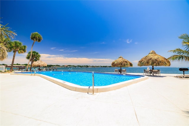 community pool featuring a patio