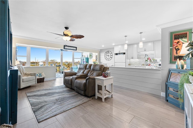 7200 Sunshine Skyway Ln S Unit 4B, Saint Petersburg, FL 33711 - living room featuring a ceiling fan, recessed lighting, crown molding, and wood finish floors