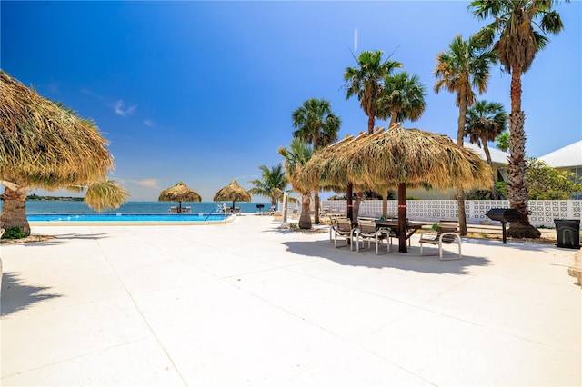 7200 Sunshine Skyway Ln S Unit 4B, Saint Petersburg, FL 33711 - surrounding community with a patio and a pool
