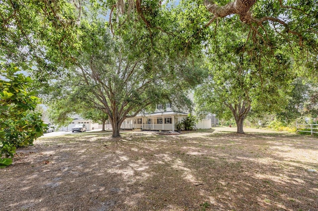 view of yard with a porch
