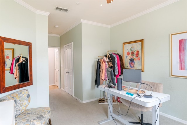 carpeted home office with crown molding, baseboards, and visible vents