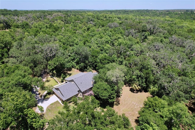 16224 Iola Woods Trl, Dade City, FL 33523 - drone / aerial view featuring a forest view