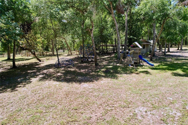 16224 Iola Woods Trl, Dade City, FL 33523 - view of yard with a playground